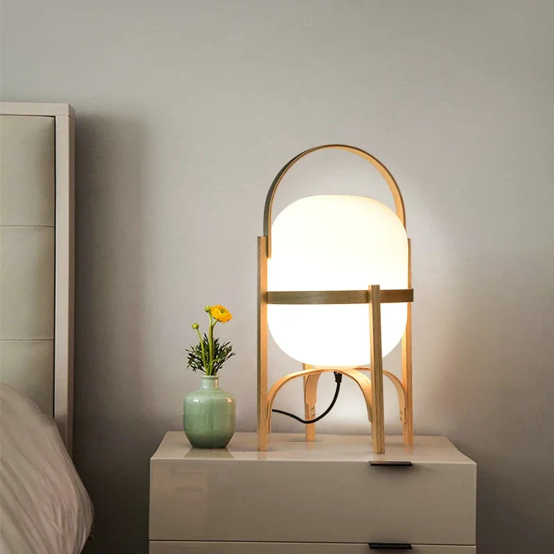 Wooden arc lamp on bedside table with warm lighting