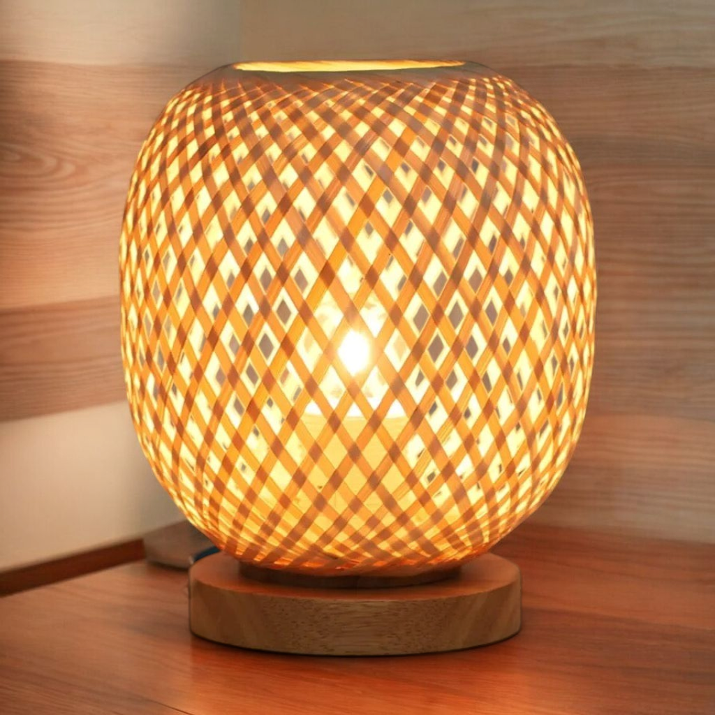 Bamboo shadow lamp on nightstand with warm ambient lighting